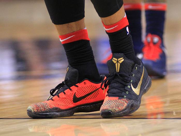 Chicago Bulls guard DeMar DeRozan's red and black Nike Kobe sneakers.
